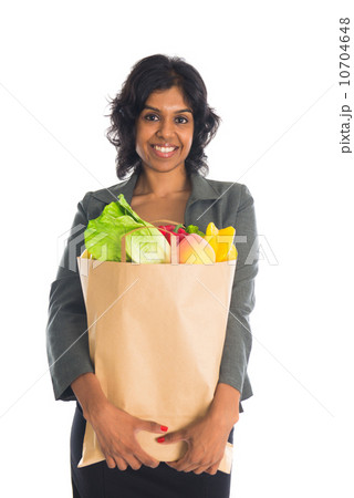 indian female shopping with business attire and white background indian female shopping with business attire and white background 10704648
