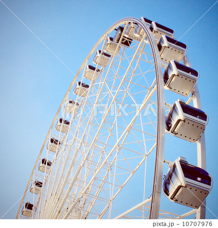 Ferris wheel with clear blue sky, retro filter effect Ferris wheel with clear blue sky, retro filter effect 10707976