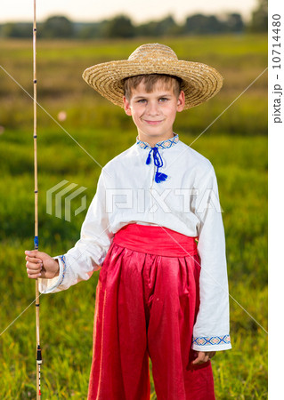 Photo of little kid pulling rod while fishing on weekend 10714480