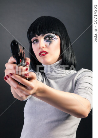 Beautiful woman with face art trying to make suicide 10714501