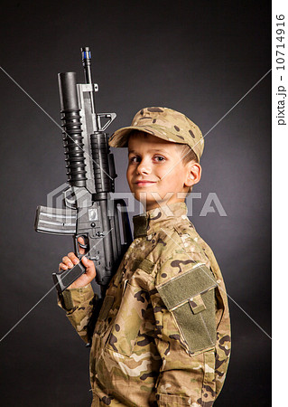 Young soldier with rifle 10714916