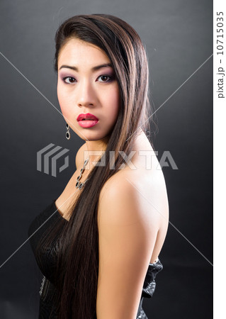 Beautiful brunette Asian woman with long black hair 10715035