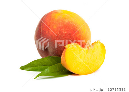 One perfect, ripe peache with slices isolated on a white backgro 10715551
