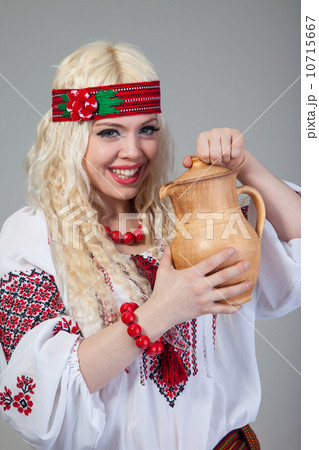 Woman wears Ukrainian national dress Woman wears Ukrainian national dress 10715667