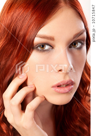 Portrait of young woman with red hair Portrait of young woman with red hair 10715847