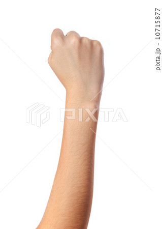 Female hand with a clenched fist isolated Female hand with a clenched fist isolated 10715877
