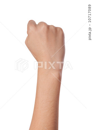 Female hand with a clenched fist isolated 10717089