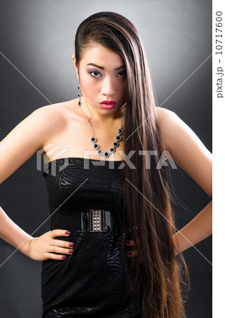 Beautiful brunette Asian woman with long black hair 10717600