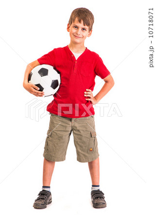 Cute boy is holding a football ball. Soccer ball Cute boy is holding a football ball. Soccer ball 10718071