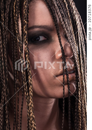 Portrait of an african american woman with dreadlocks 10718376