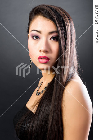 Beautiful brunette Asian woman with long black hair 10718788