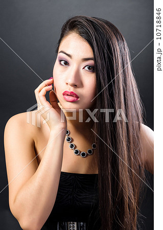 Beautiful brunette Asian woman with long black hair 10718846