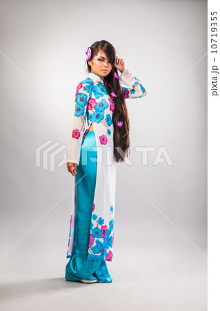 Beautiful asian woman wears a national dress 10719355