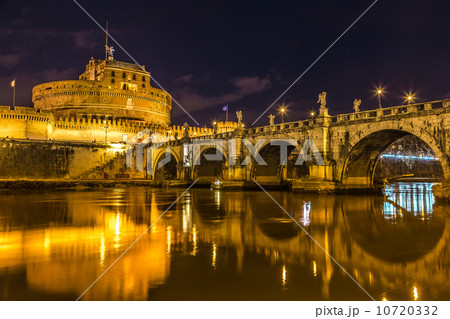The night view of the castle and bridge of Sant'Angelo in Rome,I 10720332