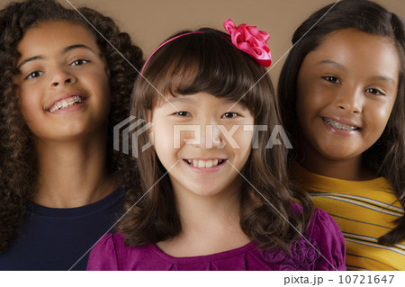 Studio portrait of three girls (10-11) Studio portrait of three girls (10-11) 10721647