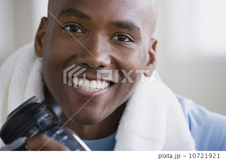 Portrait of smiling young man in gym 10721921