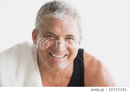 Portrait of smiling mature man in gym 10722181