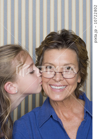 Portrait of girl (8-9) with grandmother 10722802
