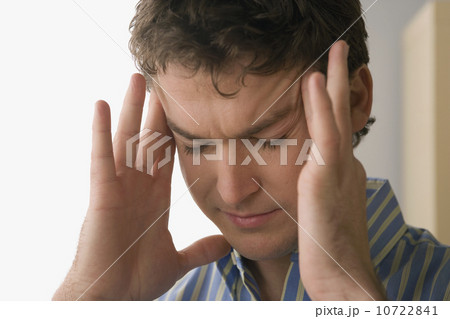 Young businessman under emotional street Young businessman under emotional street 10722841