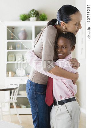 Mother and Son (12-13) hugging Mother and Son (12-13) hugging 10723252