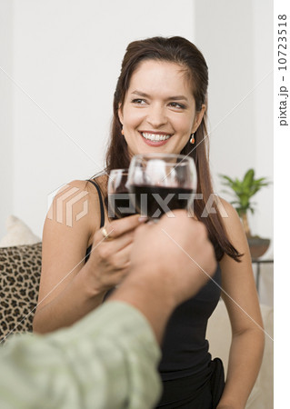 Smiling woman toasting 10723518