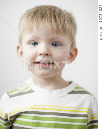 Studio portrait of happy toddler boy (2-3) 10724022