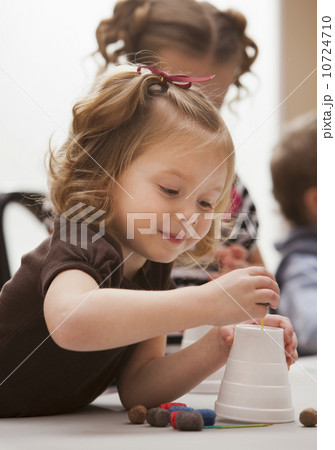 Girl (2-3) playing in kindergarten 10724710