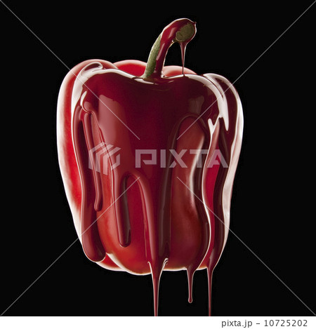Studio shot of red bell pepper covered with red paint 10725202