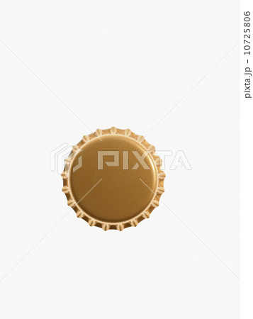 Studio shot of yellow  bottle cap 10725806