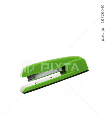 Green stapler on white background 10726040