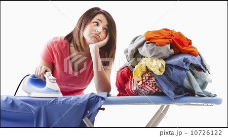 Young woman ironing 10726122