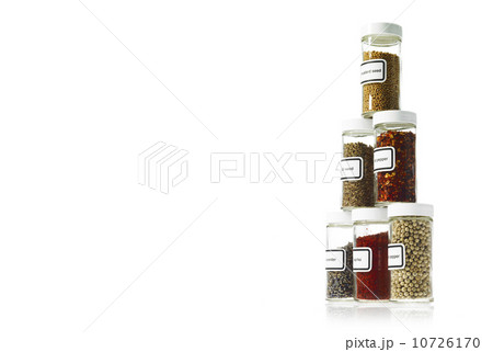 Studio shot of Jars with spices on white background 10726170