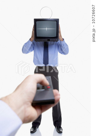 Man holding television and remote 10726607