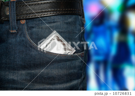 Concept photo of safety sex on date. Condom at the pocket. 10726831