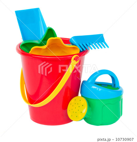 Beach bucket with spades Beach bucket with spades 10730907