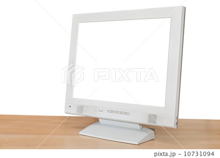 side view of grey computer display on wood table side view of grey computer display on wood table 10731094