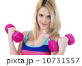 Isolated on white woman with dumbbell 10731557