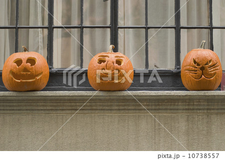 Jack-o-lanterns on window sill Jack-o-lanterns on window sill 10738557