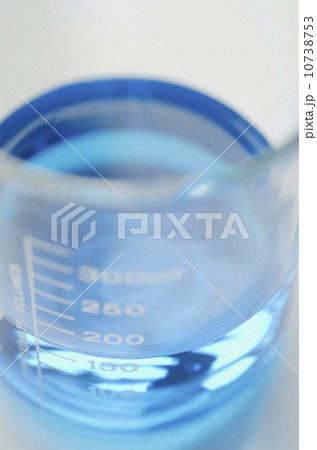 Studio shot of laboratory beaker with blue liquid 10738753