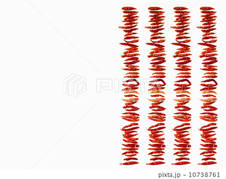 Studio shot of Red Chili Peppers on white background 10738761