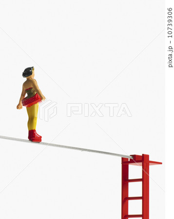 Studio shot of figurines on ladders Studio shot of figurines on ladders 10739306