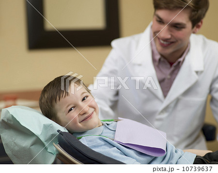 Dentist and patient in dental surgery Dentist and patient in dental surgery 10739637