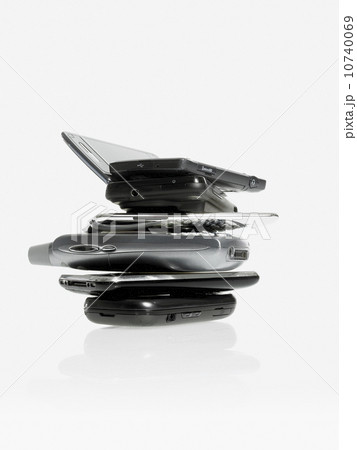 Studio shot of pile of laptops and palmtops 10740069