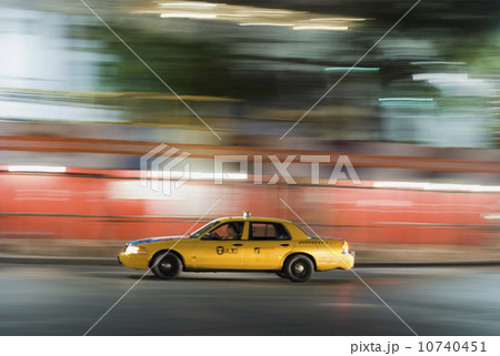 Taxi cab driving at night Taxi cab driving at night 10740451