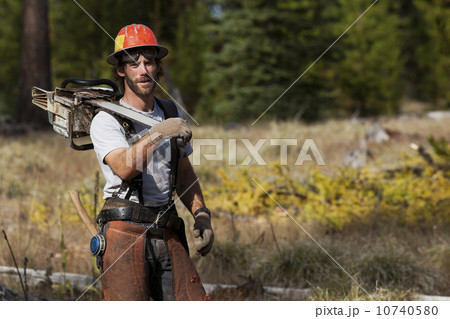 USA, Montana, Lakeside, portrait of lumberjack USA, Montana, Lakeside, portrait of lumberjack 10740580