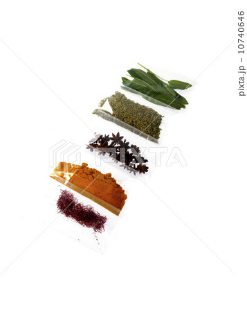 Studio shot of row of packets with spices Studio shot of row of packets with spices 10740646
