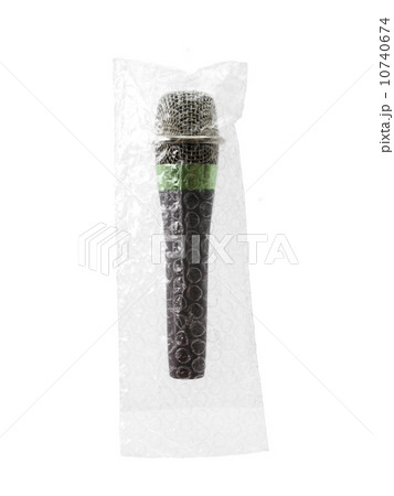 Studio shot of unplugged microphone still in bubble bag Studio shot of unplugged microphone still in bubble bag 10740674