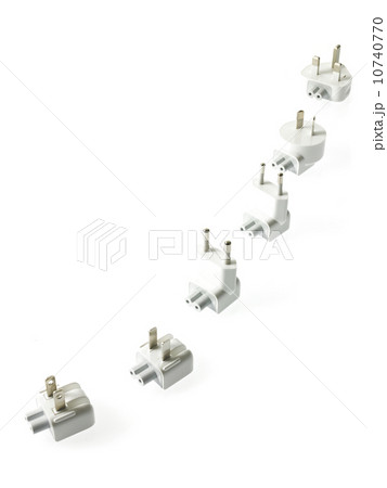 Row of plugs on white background Row of plugs on white background 10740770