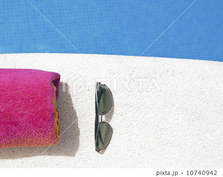 Spain, Costa Blanca, Sunglasses and towel 10740942