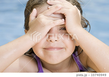 Spain, Costa Blanca, Girl (6-7) in swimming pool Spain, Costa Blanca, Girl (6-7) in swimming pool 10740949